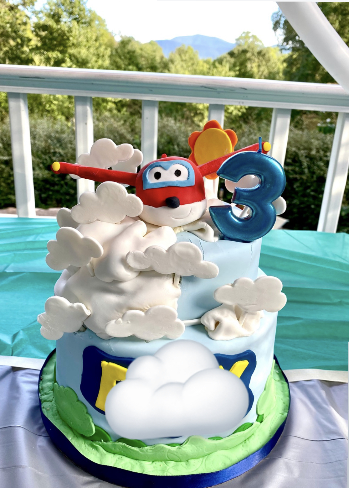 Superwings cake from the year before. I think it was a chocolate marble swirl