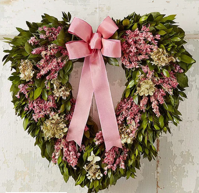 heart wreath with pink bow, could keep this one up in your home until spring