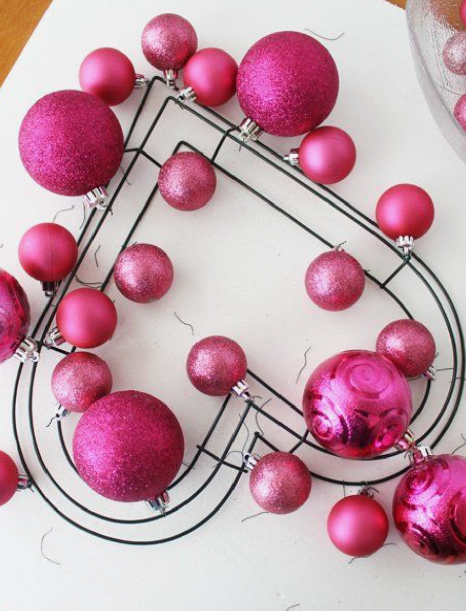 DIY Valentine wreath using pink christmas ornament balls