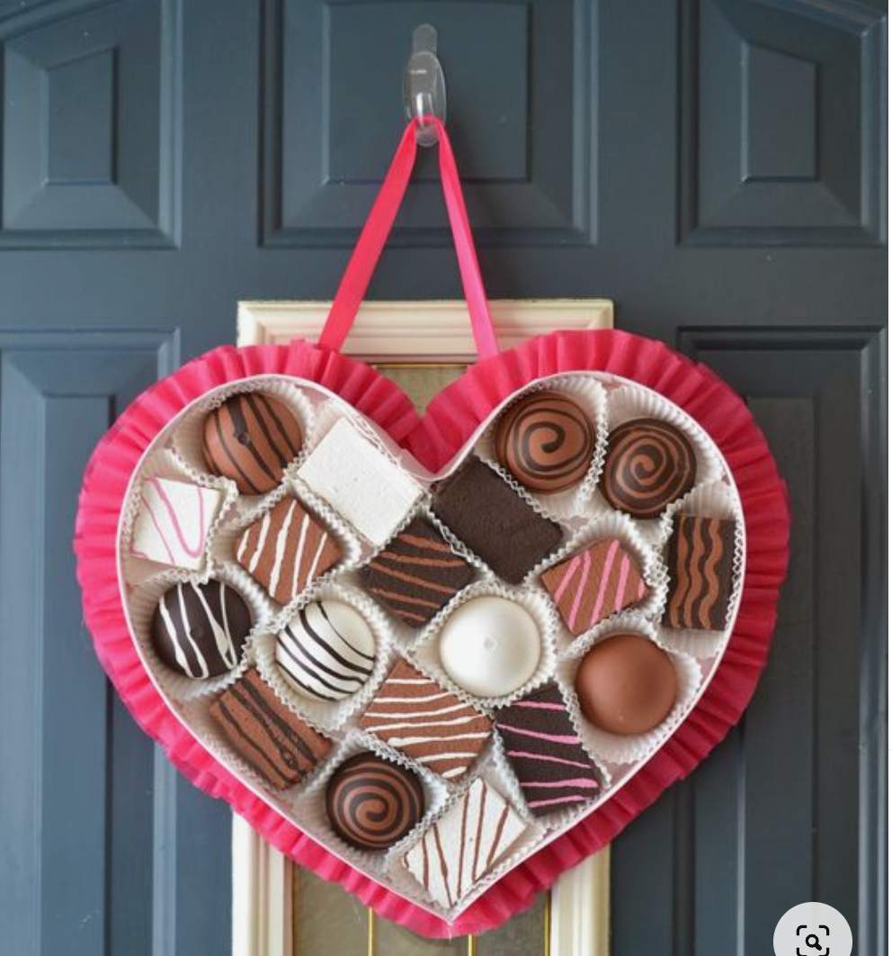 Unique wreaths add a little suprise. Like the colored here espeically against the red. She offers a tutorial on how she put this together on her site. 