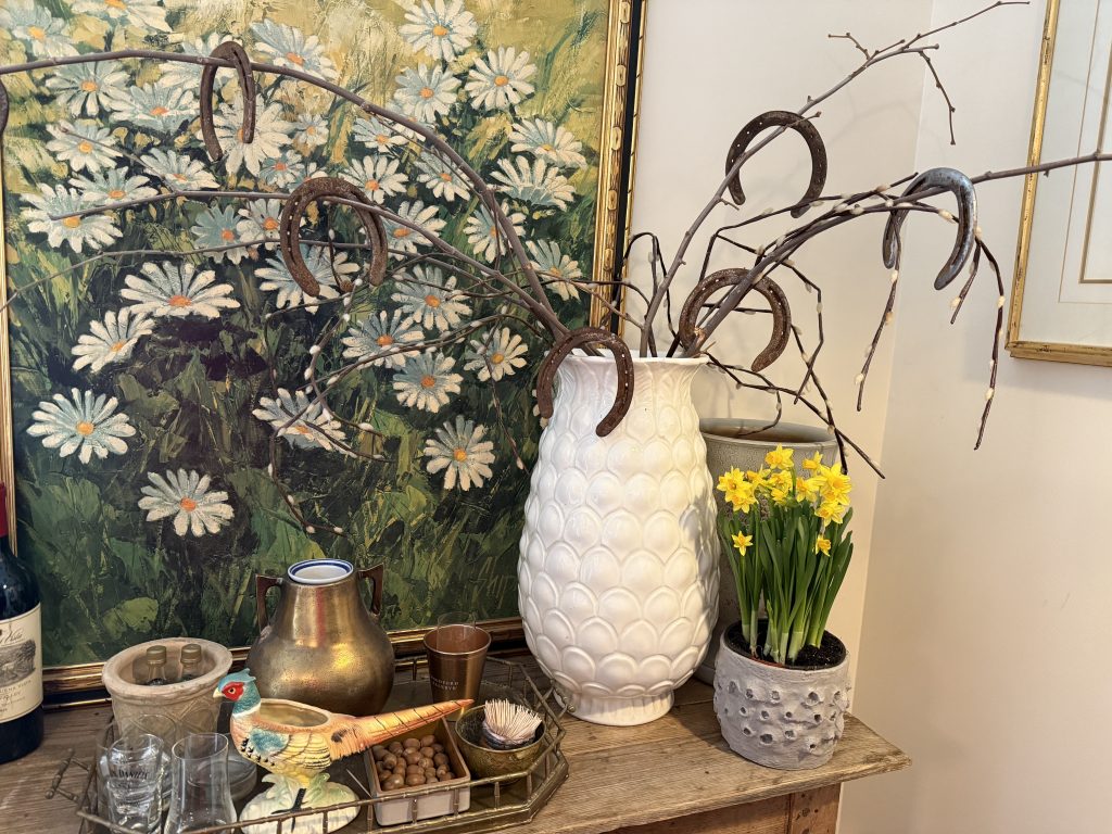 kentucky derby party decorations- horse shoes hung from branches